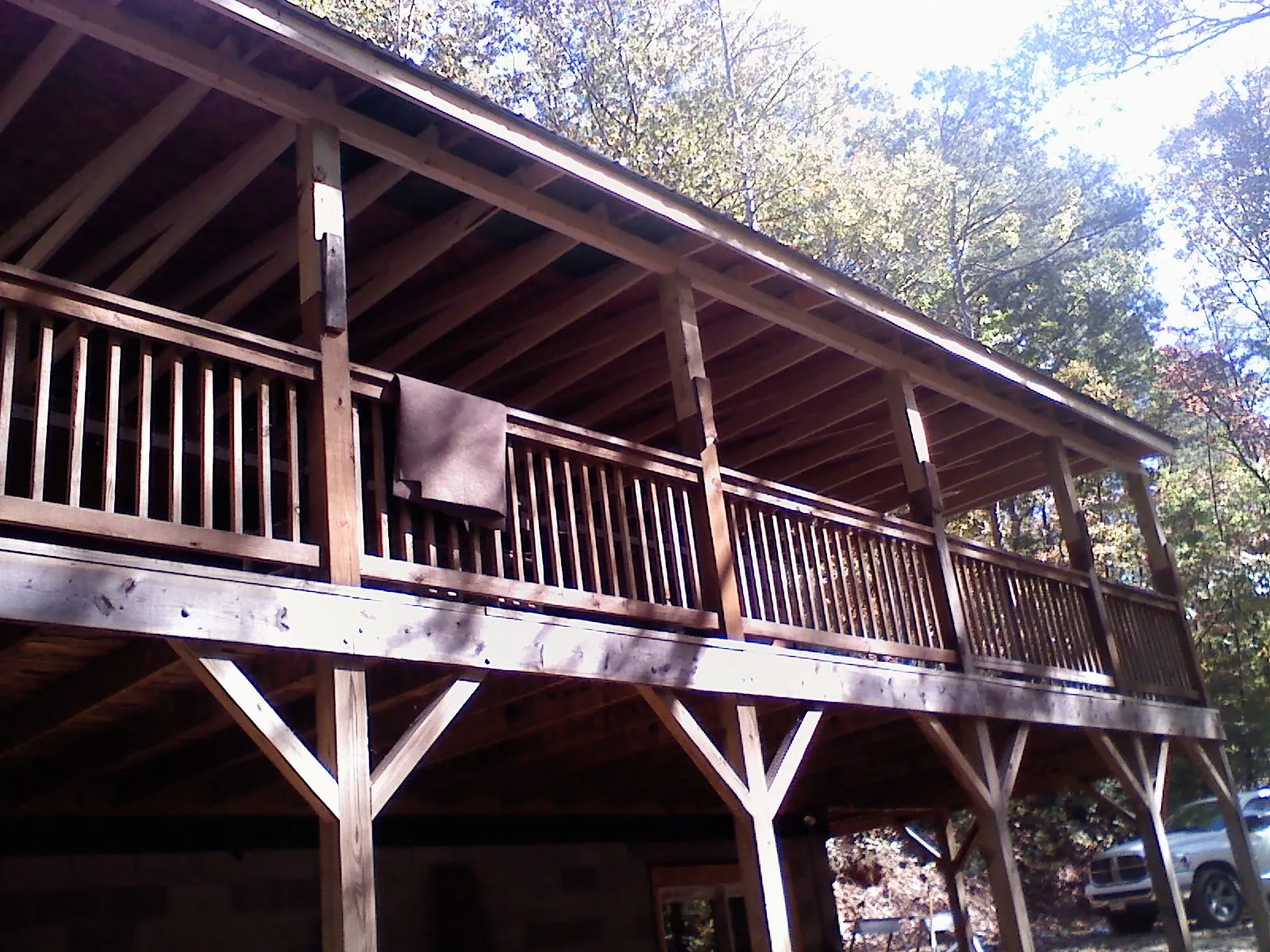 Timber framing under a new elevated porch and deck — Roof Leak Repair in House Springs by Roofing Brothers